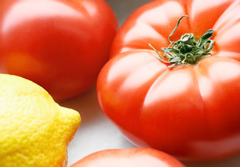 Tomatoes and lemon close up