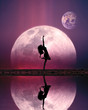 Leinwandbild Motiv girl dancing edge of lake silhouette on moon and earth planet background reflection pink blue sky fantasy