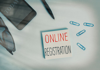Fototapete - Text sign showing Online Registration. Business photo text System for subscribing or registering via the Internet Eyeglasses colored sticky note smartphone cell clips pen pastel background