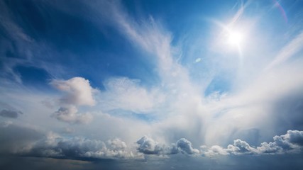 Wall Mural - picturesque aerial timelapse of changing weather from clear blue sky with bright sunshine and just a