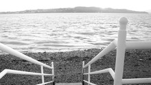 White Metal Railing By Shore Against Sea In Broughty Ferry
