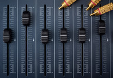 Audio Mixer With Foreground Faders And Audio Cables With Golden Rca Connectors
