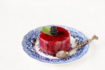 Canvas Print - semolina pudding with blackberries. Soft focus. Copy Space