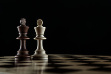 Only Two Chess Kings On A Chessboard Front View On Black Background With Copy Space