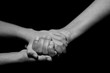 © ErdalIslak - son father,  son, father, hand, black and white, helping hands, help, helping hand, white, black, hold, family, together, son and father, handshake, friendship, people, isolated, human, agreement, chi