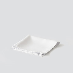 Wall Mural - white napkin on light grey background