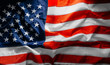 © Mykhailovskyi - close american flag in the wind on a sunny day