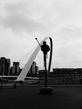 Low Angle View Of Gateshead Millennium Bridge Against Sky In City