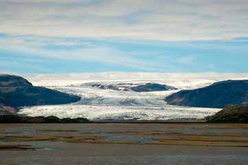 Wall Mural - big glacier coming down to sea