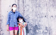 © prasit - .Asian mother-child wearing a protective mask to prevent dust, PM 2.5, and Corona virus