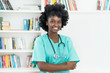 © Daniel Ernst - African american medical student or young nurse at work
