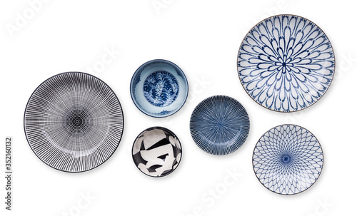 Fotografía Top view of beautiful crockery set with porcelain ceramic plate round dish and cup bowl