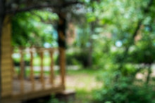Blurred Background. Terrace Of A Residential Building Near The Forest.