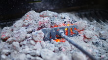 Close-up Of Hot Barbecue Coal And Ashes