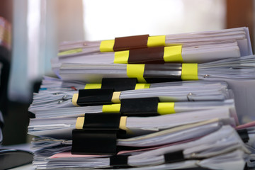 Wall Mural - Piles unfinished documents reports files with sticky notes, overwork paper corner on teacher school desk office at university. Stack of messy paperworks assessment legal folder at workplace