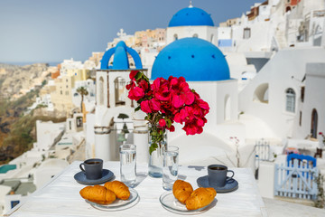 Wall Mural - Morning coffee and croissants against the sea