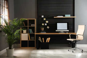 Poster - comfortable workplace with computer and office chair. stylish room interior
