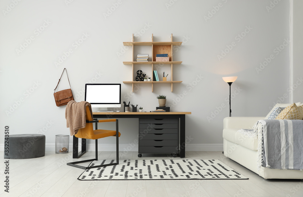 Stylish room interior with modern comfortable workplace - obrazy, fototapety, plakaty 