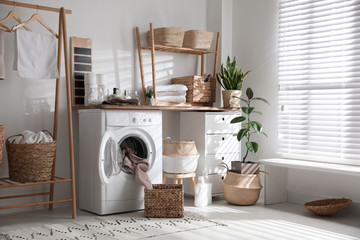 Poster - Stylish bathroom interior with modern washing machine