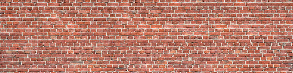 panorama of an old red brick wall as a background or texture