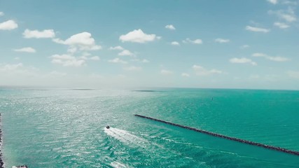 Wall Mural - Miami Beach from South Pointe Park, slow motion aerial view on a beautiful sunny day