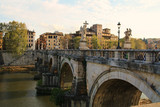 Fototapeta Paryż - The view of Roman bridge in Italy. The view of ancient rome
