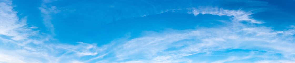 panorama of a blue sky with white clouds as a backround
