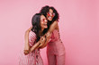 © Look! - Amazing, beautiful lady rejoice and enjoy photo shoot in pink. African girls with curly hair in sunglasses laugh
