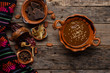 Mexican mole sauce on wooden background