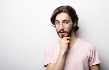 cheerful man wearing glasses over white background