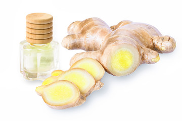 Wall Mural - Small glass bottle of extract essential aroma ginger oil with fresh ginger root with slices isolated on white background. Herbal plant concept. 