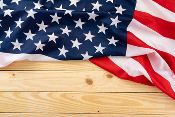 Wall Mural - US American flag on wooden background. For USA Memorial day, Presidents day, Veterans day, Labor day, Independence or 4th of July celebration. Top view, copy space for text.