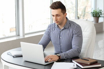 Sticker - Handsome businessman working in office