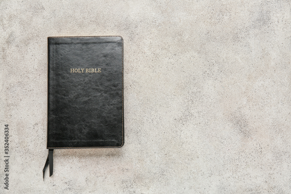 Holy Bible on grey background