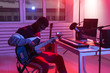 © satura_ - Create music and a recording studio concept - Black man guitarist recording electric bass guitar track in home studio