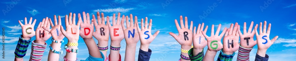 Children Hands Building Colorful English Word Children Rights. Blue Sky As Background - obrazy, fototapety, plakaty 