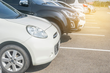 Wall Mural - Car parking in a row, front of white cars close up, automobile transportation