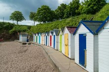 Multi Colored Huts On Beach