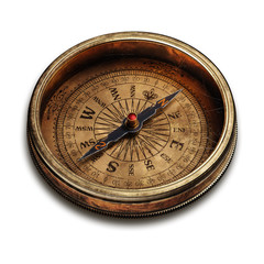 Vintage brass compass isolated on white background