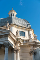 A fragment of the cathedral with statues of saints on the dome. Rome. Italy