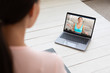 © Prostock-studio - Woman At Laptop Watching Fitness Blog Online Training At Home