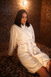 © Nomad_Soul - Woman sitting on a hot stone in hamam, sauna