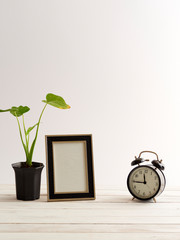 Poster - Frame mock up and black clock.