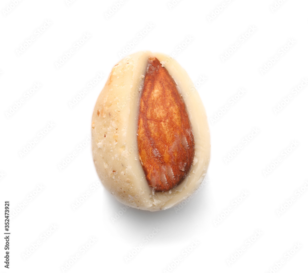 Tasty coated nut on white background