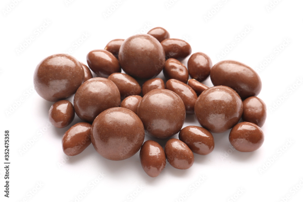 Tasty chocolate nuts on white background