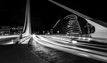 Light Trails On Samuel Beckett Bridge At Night