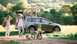© Halfpoint - Family with two small children going on cycling trip in countryside.