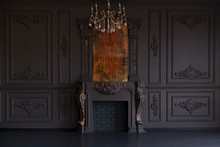 Decorative Fireplace, Vintage Mirror And Chandelier In Classical Black Room Interior