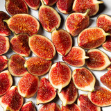 Fototapeta Kuchnia - background Figs cut into slices