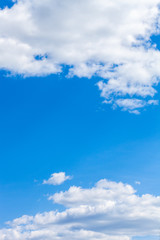 Poster - summer blue sky with white fluffy clouds.